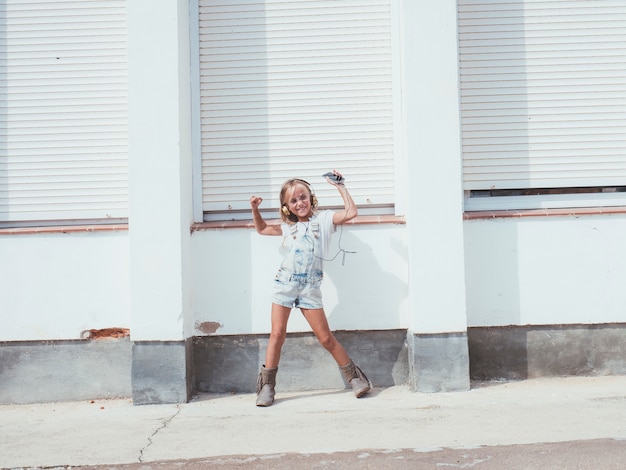 Little girl listening to music