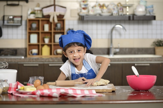 Little Girl Making Dough