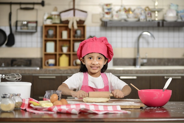 Little Girl Making Dough