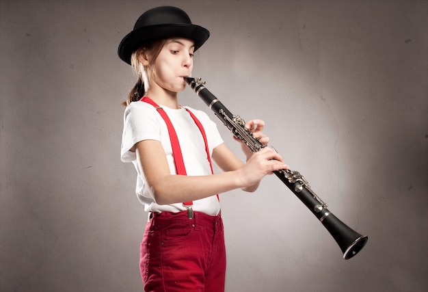 Little girl playing clarinet