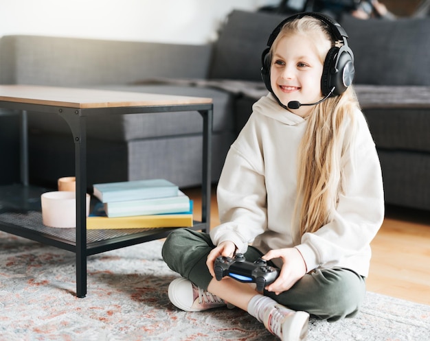 Little girl playing on games console