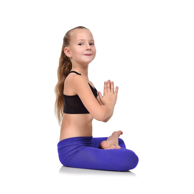 Little girl sitting lotus position