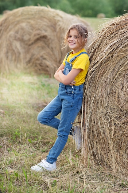 little girl in straw