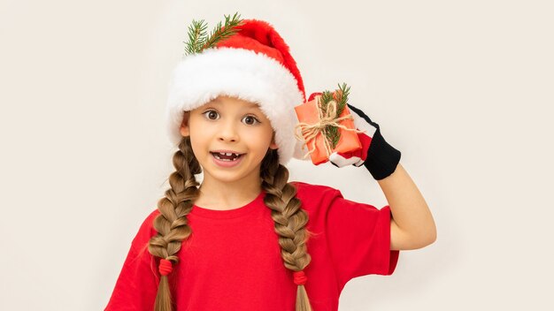 A little girl was given a gift for the christmas