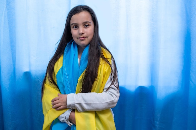 little girl with the flag of Ukraine.