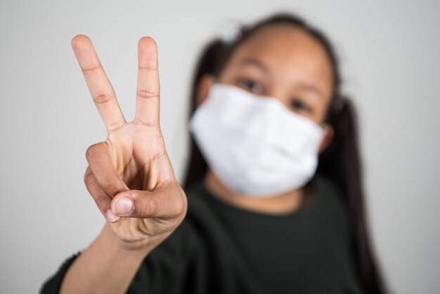 Little girl with medical mask