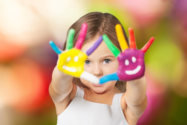 Little girl with painted hands