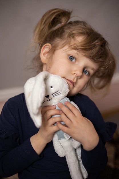 Little girl with a toy in her hands