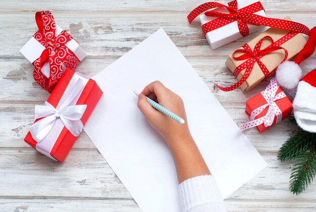 Little girl writes letter to Santa Claus