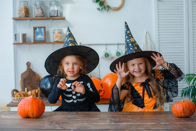 little girls in costumes for Halloween