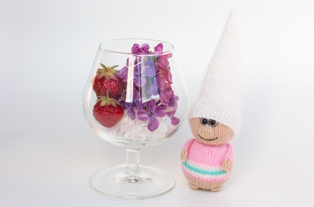 A little gnome knitted with knitting needles Gift for children holiday card