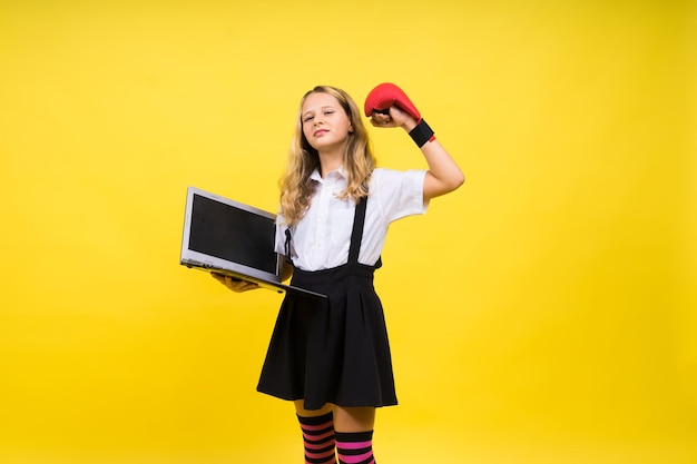 Little happy blonde kid girl 1213 years laptop pc computer Children lifestyle childhood concept