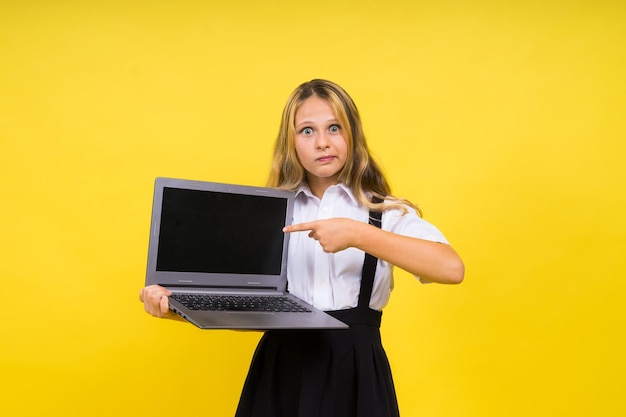 Little happy blonde kid girl years laptop pc computer children lifestyle childhood concept