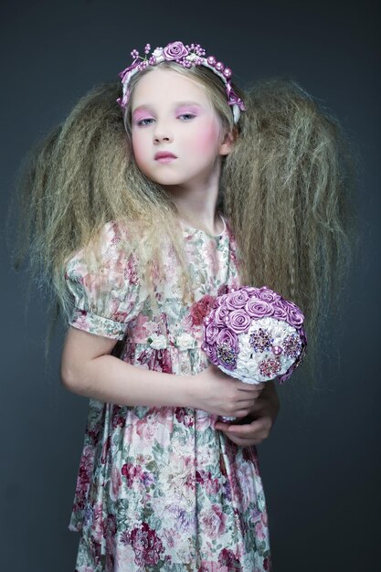 Little lady with bouquet