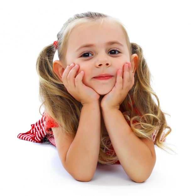 Little smiling girl on a white background