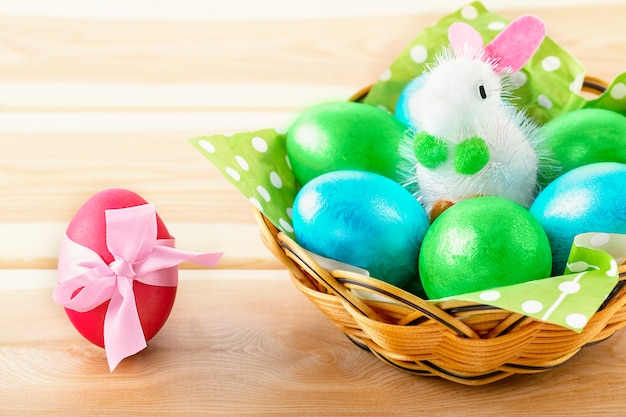 Little Toy Bunny In Basket With Decorated Egg