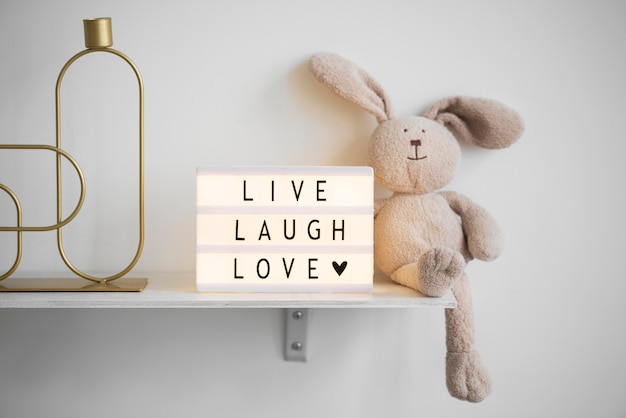 Live laugh love message on lightbox