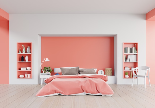 Living coral color bedroom of luxury house with double bed and shelves 