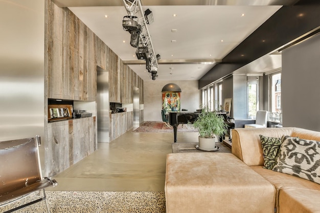 A living room with a couch and a piano