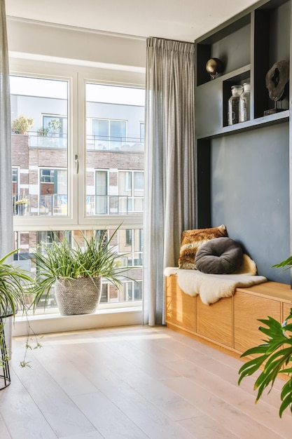 A living room with a couch and a window