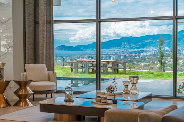 A living room with a view of the mountains