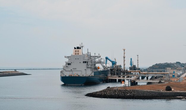 LNG Tanker In The Port At The ISPS Protected Gas Facility Vessel Designed For Gas Transportation