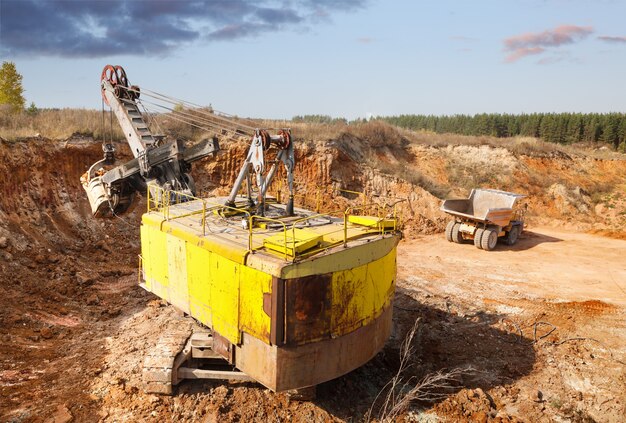 Loading of soil in the quarry excavator