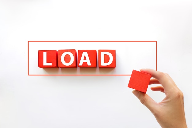 Loading with hand putting red cube in progress bar. Loading time or process concept.