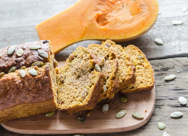 Loaf of pumpkin bread on rustic background