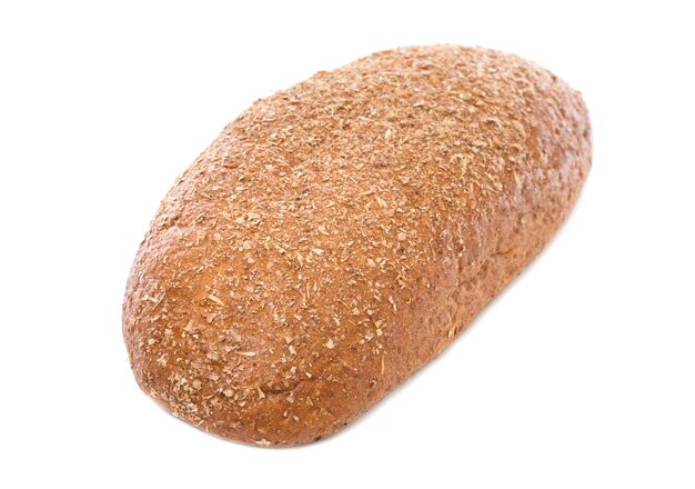 Loaf of whole rye bread isolated on white background