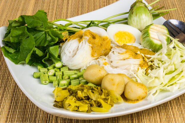 Local Rice vermicelli and curry sauce with vegetable (Kanom Jeen Nam Ya)