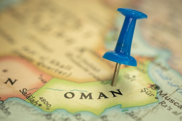 Location Oman travel map with push pin point marker closeup Asia journey concept