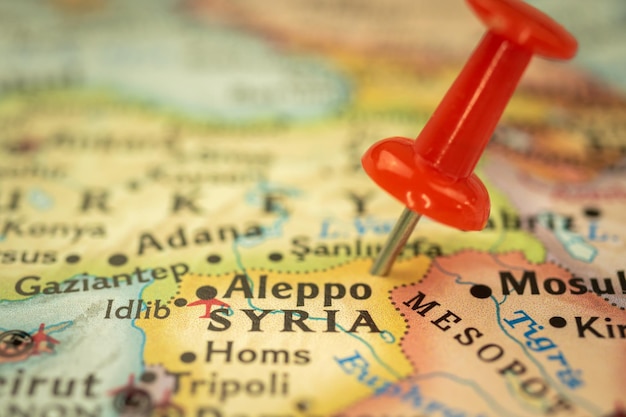 Location Syria and Aleppo travel map with push pin point marker closeup Asia journey concept