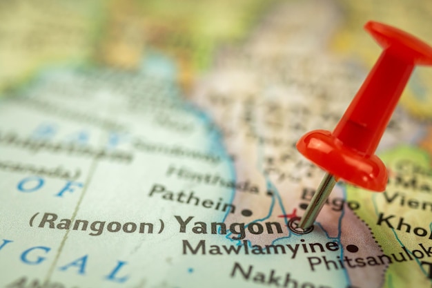 Location Yangon Rangoon in Myanmar Burma travel map with push pin point marker closeup Asia journey concept