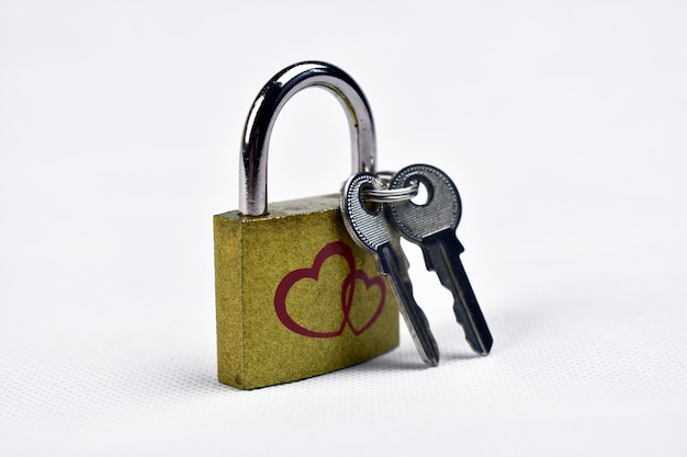 Lock with keys on a white background