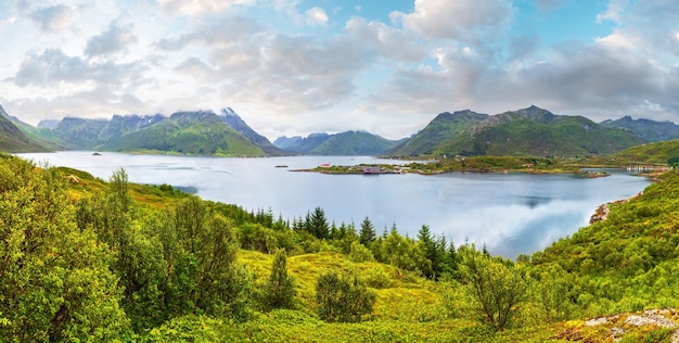 Lofoten fjord and mountains summer cloudy landscape Norway Panorama