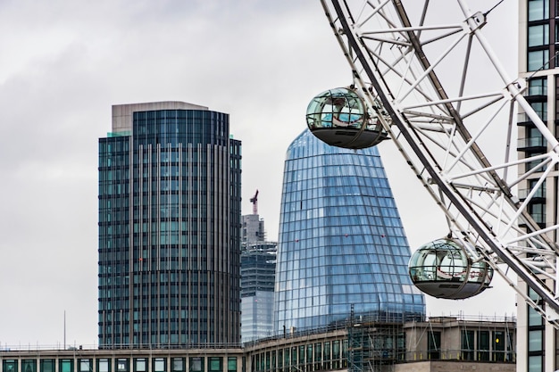 London Eye with office buildings