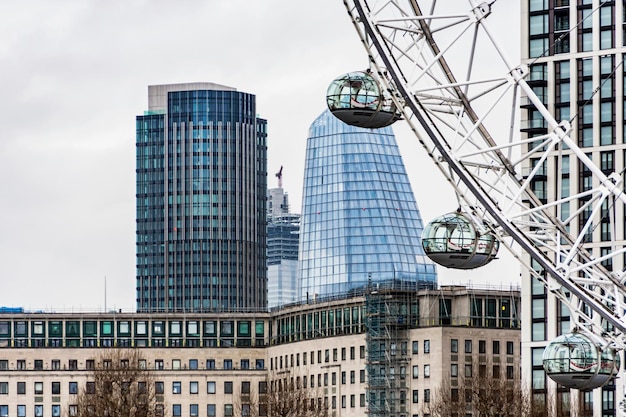 London Eye with office buildings