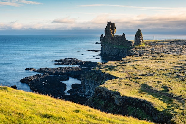 Londrangar basalt cliffs large Snaefellsnes peninsula on summer in West of Iceland