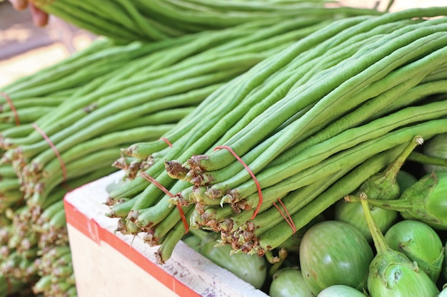 Long beans and eggplant at market