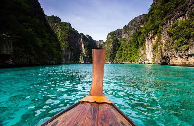 Long boat and blue water at Maya bay in Phi Phi Island, Krabi Thailand.