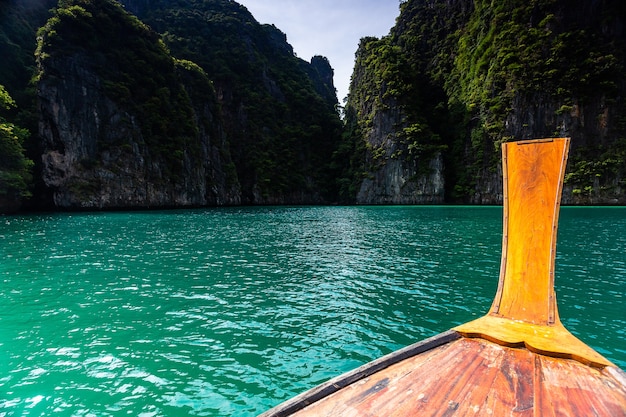 Long boat and blue water at Maya bay in Phi Phi Island, Krabi Thailand.