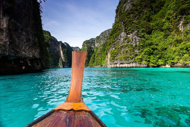 Long boat and blue water at Maya bay in Phi Phi Island, Krabi Thailand.