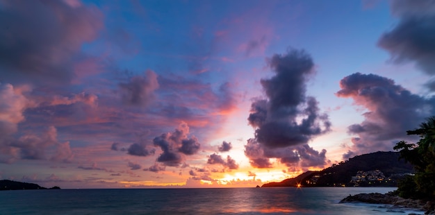 Long exposure colorful sunset or sunrise over sea Clear sky sunset with reflection light on sea surface Idyllic amazing landscape Climate change Beauty in nature environment.