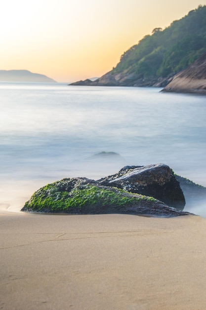 Long exposure details of the red beach of Urca in Rio de Janeiro Brazil