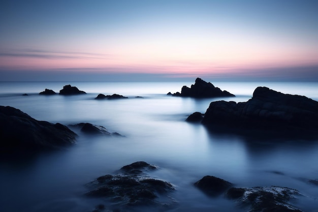 Long exposure of rocks and sea at sunset Long exposure photography