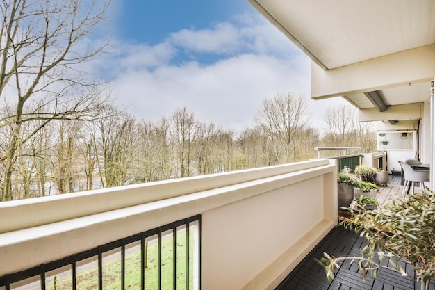 Long modern balcony with table