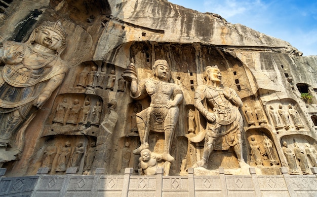 Longmen Grottoes with Buddha's figures are Starting with the Northern Wei Dynasty in 493 AD. It is one of the four notable grottoes in China.