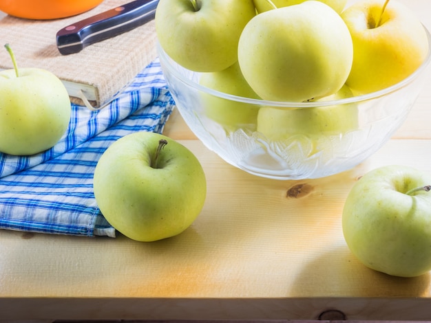 Look delicious, Apples on wooden table. Apple is a fruit that is popular around the world.