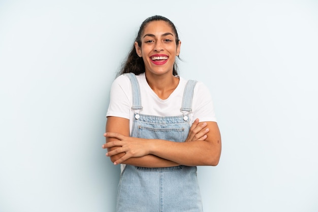 Photo looking like a happy proud and satisfied achiever smiling with arms crossed